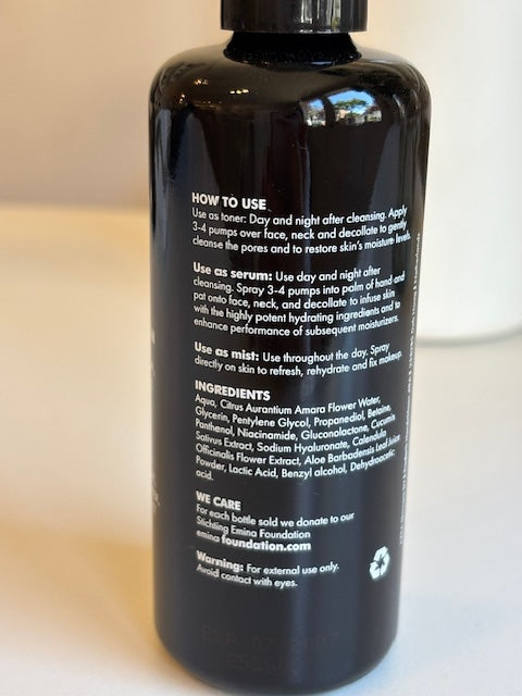 Black bottle with text on a light background